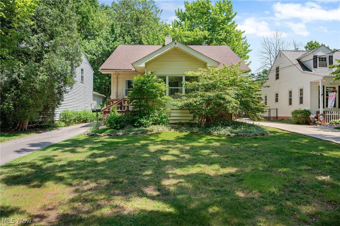 Great opportunity for a charming colonial on a quiet street in Lyndhurst! This well-kept home features over 1,100 square feet of living space with 3 bedrooms, 3 full bathrooms, and spacious living areas. The front of the home presents a beautiful screened porch. The front door opens into the welcoming living room with beautiful hardwood flooring and multiple windows for an abundance of natural light. Straight ahead is the kitchen where you can find a full complement of appliances and granite countertops. The living room is open to the dining room. Here you will find hardwood flooring and a beautiful chandelier. Down the hall you will find one full bathroom with ceramic tile backsplash and stone countertop. You will also find one bedroom with hardwood flooring and closet space. Upstairs lies the primary suite with carpeting and walk in closet space. Adjacent to the primary suite is a third bedroom. You can also find a second full bathroom with ceramic tile flooring and granite countertop. The lower level offers a laundry area and plenty of extra storage space with access to the third bathroom. The fully fenced-in backyard has a 2-car detached garage and large deck for entertaining. Convenient location just minutes away from schools, shops, and highway access. Don't miss this one!