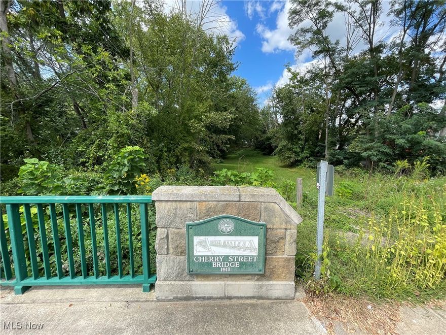 Rare Downtown Canal Fulton Land Opportunity! 156 W. Cherry St. and 147 W. Market St., Canal Fulton, Ohio 44614. An incredible chance to own a unique piece of land in the heart of historic Downtown Canal Fulton along the scenic Tuscarawas River! This listing includes two separate parcels being sold together—one residentially zoned and one commercially zoned—with the potential for consolidation.

Property Details: Residential Lot – 156 W. Cherry St. (.341 acres), Commercial Lot – 147 W. Market St. (.124 acres), Located in the B1 zoning district, Previously connected to sewer and water lines, conditions to build requires further investigation due to proximity to Tuscarawas River (flood zone).

Enjoy this prime location just steps from the Towpath, Canal Fulton Canoe Livery & Campground, the Ohio & Erie Canal, and a variety of charming shops and restaurants. With endless possibilities, this property is perfect for investors or anyone looking to create a unique space in a thriving community. Enjoy the convenience of being near canoeing, kayaking, hiking, fishing, shopping, and more!

Don’t miss out on this one-of-a-kind Canal Fulton property!