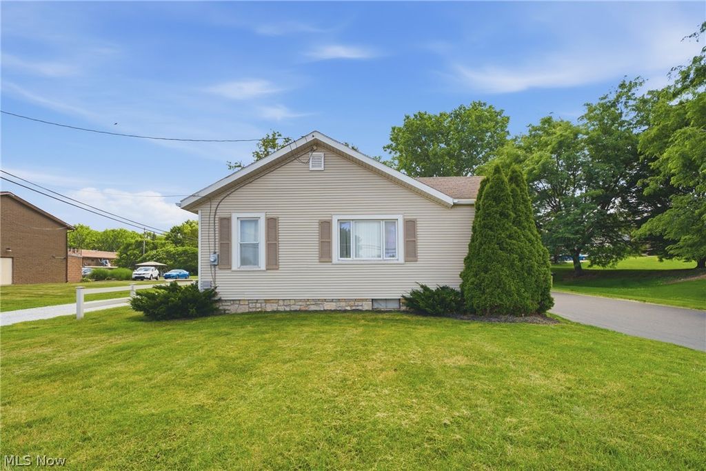 Photo of 679 Saint Andrews Court, Akron, OH 44312 (MLS # 5222416)