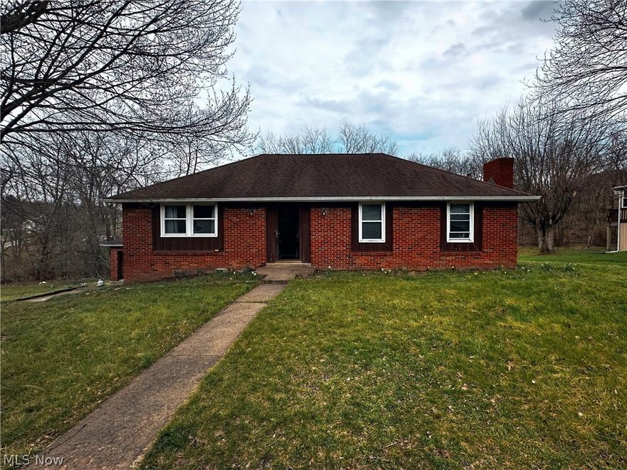 This charming 3-4 bedroom brick ranch offers plenty of space and sire at the end of a quiet street. The two car oversized garage gives ample storage space and the back deck is great for entertaining. With solid construction and great bones, this home is filled with of potential and just waiting for your personal touch. A little TLC will go a long way in transforming this property into your dream home or a fantastic investment opportunity! Just minutes away from Tomlinson Run St Park! Call me today for a tour.