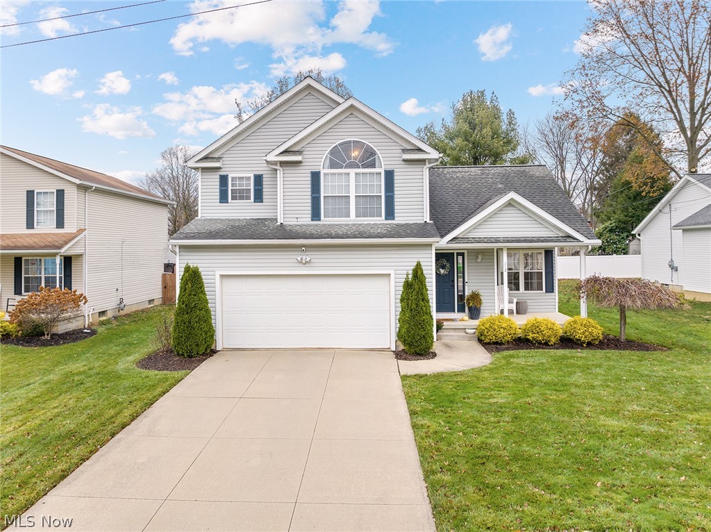 Modern and bright, newer built colonial in Munroe Falls, perfect for entertaining! Vaulted ceiling and gas fireplace in the great room open to the dining area and updated kitchen with island. Convenient first floor half bath. Upstairs you'll find a spacious owners suite with vaulted ceilings, walk in closet and private bathroom. 2 nicely sized secondary bedrooms and full guest bath complete the second floor. Modern neutral paint throughout, newer LVT floors, and new light fixtures. Beautiful stamped concrete patio with fire pit to enjoy warm evenings. Attached 2 car garage. Unfinished 12 course basement has tons of potential! Dont miss this one!