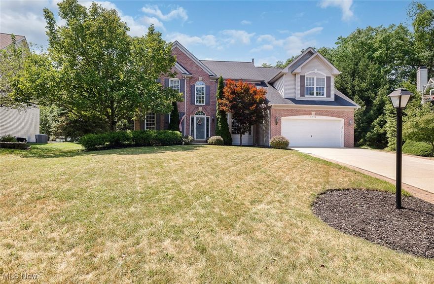Welcome to this stunning 5 bedroom brick front Colonial nestled in the highly sought after Westwood Farms community of Strongsville! Boasting over 3,651 square feet plus an additional 1,500 square feet of finished space in the lower level, this home offers an exceptional blend of elegance, functionality, and comfort. From the moment you step into the 2 story foyer, you’re welcomed by an impressive sense of space, flanked by a versatile flex room and a formal dining room enhanced by a beautiful bay window. At the heart of the home, the dramatic 2 story great room showcases a floor-to-ceiling stone fireplace and opens seamlessly to the nicely remodeled kitchen. Here you’ll find modern wood cabinetry, granite countertops, a stylish backsplash, stainless steel appliances, and a casual dining area perfect for everyday living. A private home office, convenient powder room, and first-floor laundry room complete the main level. Upstairs, the open staircase leads to four generously sized bedrooms, including a luxurious vaulted primary suite. This serene retreat features a sitting area, a spa-like bath with a corner soaking tub, a walk-in shower, double vanity, and an expansive walk-in closet. The finished lower level extends your living and entertaining space with a large recreation area highlighted by garden windows, a full bath, and a fifth bedroom ideal for guests or extended family. Step outside to your private backyard oasis, where a custom paver patio, outdoor fireplace, and tree-lined yard offer both tranquility and privacy. Newer Roof (2018). As a resident of Westwood Farms, you’ll enjoy access to exclusive community amenities including tennis courts, a clubhouse, and a swimming pool—bringing resort-style living right to your doorstep. This one-of-a-kind home perfectly balances timeless craftsmanship with thoughtful modern updates. Don’t miss your opportunity to make it yours—schedule your private tour today.