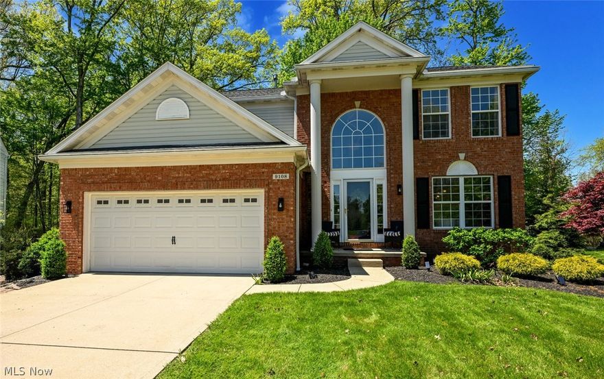 Stunning brick colonial on a quiet cul-de-sac lot backs to mature trees for exceptional privacy! Soaring 2-story foyer w/ gleaming hardwood floors & dramatic open staircase w/ walnut treads & sleek black metal railing sets the tone. Open-concept main level features a spacious family room w/ white brick fireplace, designer lighting & large windows overlooking the backyard. Updated eat-in kitchen boasts white cabinetry, subway tile backsplash, gas range, SS appliances & center island opens to dining area & deck for effortless entertaining. Generously sized bedrooms w/ ample natural light. Updated baths throughout. Step outside to your private backyard oasis: large composite deck w/ white railings + flagstone patio w/ fire pit area perfect for gatherings! Professionally landscaped front yard w/ ornamental trees & lush beds delivers incredible curb appeal day & night. 2-car attached garage. Storage shed included. Prime cul-de-sac location. This one won't last!