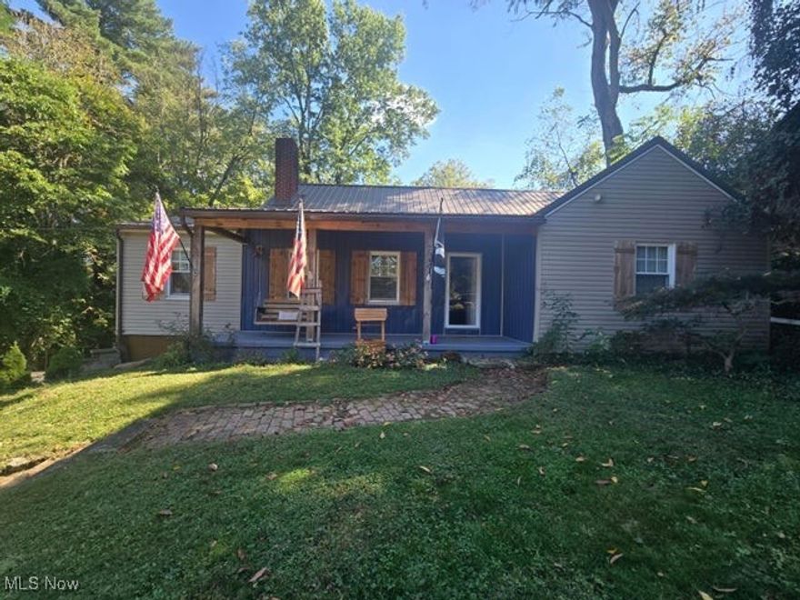 This adorable, 4 bed 2 bath home is in one of North Zanesville's most desirable neighborhoods! Sitting on over a third of an acre, it is surrounded by trees and feels extremely private while being right in the heart of the city. The beautiful front porch welcomes you and offers plenty of space to relax and watch life go by. As you enter, you find the beautiful living area featuring a gorgeous fireplace with built-ins. It flows perfectly into the dining area which leads to your beautifully updated kitchen with stainless steel appliances and Corian countertops. On the main level you will also find three large bedrooms and two full baths. The second level offers endless possibilities as a spacious master, 4th bedroom or a great space for the kids! The full, walk out basement has a great workshop and offers an additional 1,384 square feet that can be anything you want! New Roof and Siding in 2021, New Water Heater, Updated baths, fresh paint, and new and refinished flooring throughout! And for all you nature lovers, this backyard is an oasis where you will regularly see deer and other wildlife right from the comfort of your own back porch. The large deck and backyard are perfect for entertaining all your guests. This is a must see and it will go fast! The military family who has loved and called this home for the last 10 years is excited to see their house go to a new family who will love it just as much! Call today for a private showing!