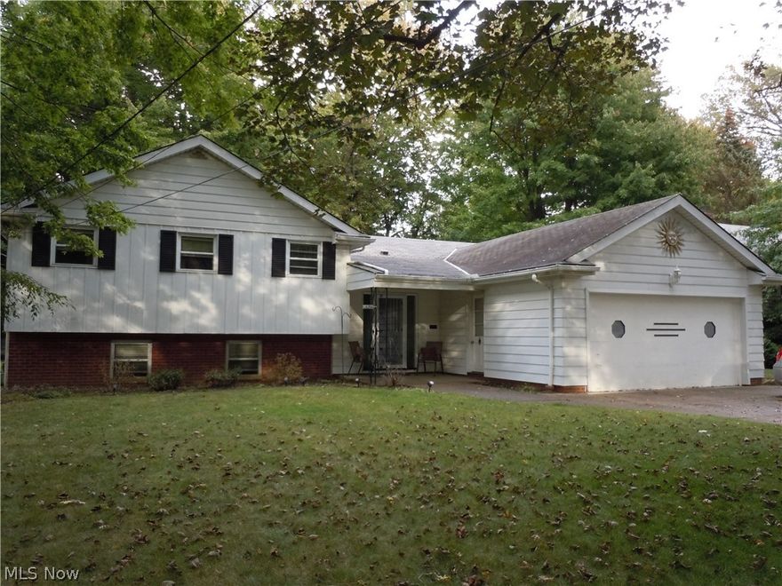 Fantastic open floor plan split level home with many updates! This 3 bedroom 2 bath home has great features and great potential. The pride of ownership shows in the newly renovated kitchen that flows into dining room that continues on to the screened in patio to further enjoy the serenity of the lot. The lower level oversized family room features a wood/gas fireplace for those chilly Northeast Ohio winters. Great floor plan with lots of storage! A Must See. Call Today to Schedule Your Private Tour!