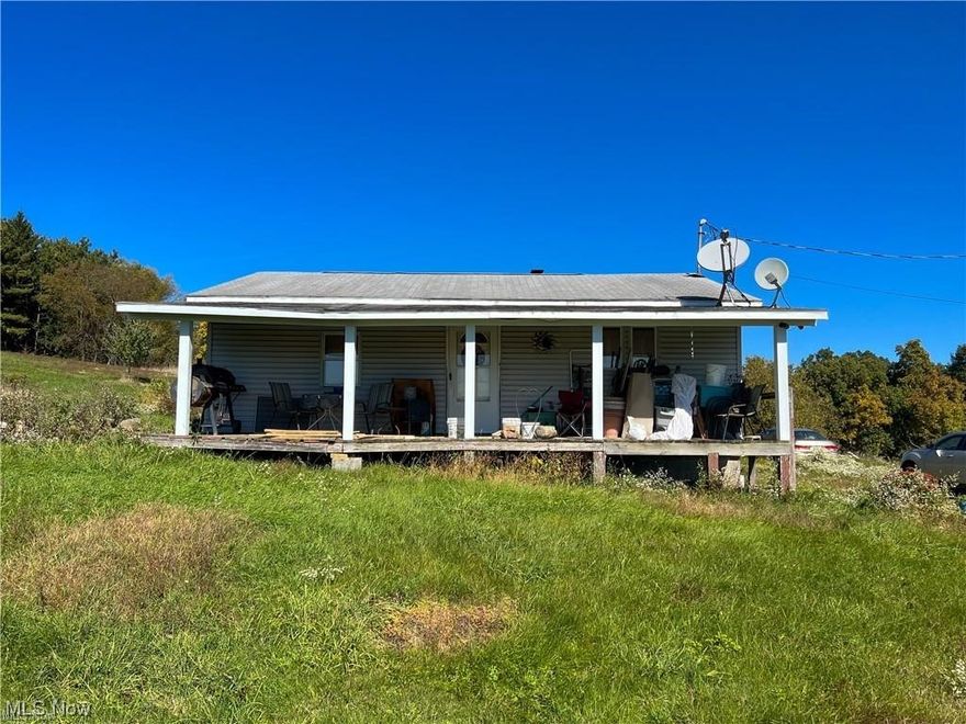 Amish-built, 3 bedroom farm house in the country hills of Salineville. Newly renovated bathroom with spacious shower is our sellers favorite feature! Updated kitchen counters and sink. Expansive closet space and plenty of room for updates as this home sits on 6.2 acres of land! Enjoy natural spring water and a pellet heating system! Great for outdoorsy living as property is only 2 miles from hunting and fishing areas such as Sportsman’s Lake. Ideal for four-wheeling and ATVs! Garage for Semi trailer could use some TLC but is a geerhead’s haven! Like to build? No zoning restrictions!