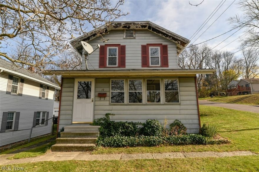 Start you New Year off living in this spacious three bedroom Colonial in Ellet.  This warm home features natural woodwork throughout, the large bedroom on the first floor has a full bath and a sliding glass door that walks out into a 16 x 22 foot wood deck. The laundry room is on the first floor not down in the basement. Two bedrooms with a full bath are waiting for you at the top of the stairs. Appliances are negotiable.