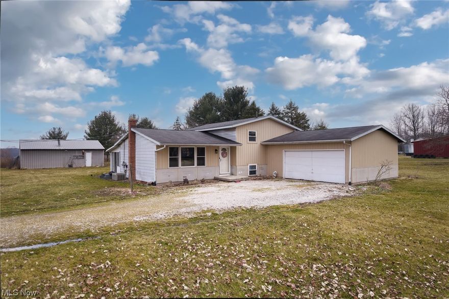 If privacy and acreage are what you've been waiting for, this incredible Atwater property is for you. Spacious 3 bedroom right hand split and over 1600SF of living area positioned nicely on 11+ acres in Waterloo Schools. Enjoy an updated open floor plan on the main level with living, dining and beautifully updated, open-concept kitchen (fully applianced) with solid wood cabinetry and counter space for the most demanding of chefs. Access to the three season room from the dedicated dining area and access to the sprawling acreage of the backyard from there. Upstairs, three nicely sized bedrooms with ample closet space, and a charmingly updated full bath with double vanity. Downstairs, additional space to relax and unwind in the rec room, and a walkout laundry room with garage access, plus a framed bonus room for crafting, play, or storage awaits. Down the final few stairs you'll find the lower level with softener and pressure tank (appx 3 years young!) plus the fuel oil storage, furnace, HWT and sumps. Outside the home you'll appreciate the outbuildings affording loads of storage (24x20) and the 32x24 pole barn as well. Horses? Yep. A stocked pond and wooded acres complete the offering, which affords privacy, charm, and the rustic feel of country living, just minutes from NEOMED, the highway, and convenient shopping and dining. Bring your vision and make this gem your own, today.