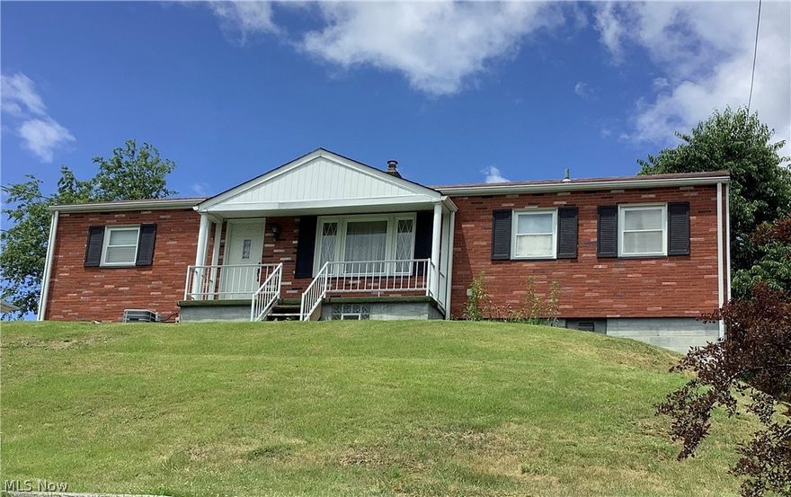 This is a clean, well built, solid home in a quiet neighborhood.  As per seller, there are hardwood floors under the carpet upstairs.  Not in kitchen or bath. You must see the large family room on the lower level.  The family room has a full bar and would be great for family gatherings and entertaining.  There is also a laundry area on the lower level that could house a second kitchen and an additional bath.