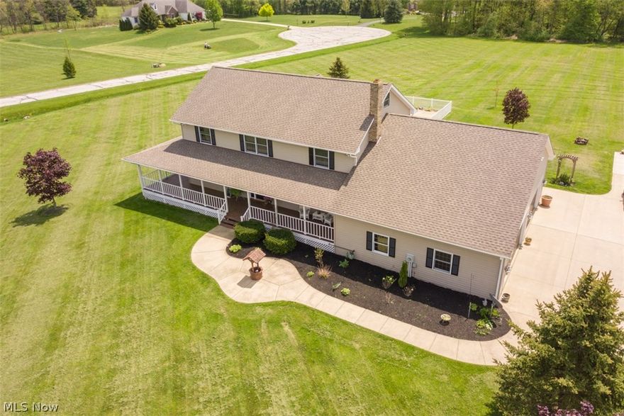 This custom build home features a large eat in kitchen with open access to dining room and family room with a stone wood burning fireplace.  The oversized living room has French doors leading to a complete wraparound covered porch and 3 tier deck leading to a 20x44 inground heated pool, bath house with changing rooms, entertainment center and outdoor lighting.  The second story boasts 3 large bedrooms with a vaulted master suite featuring a large walk in closet and master bath with a large jacuzzi tub.  The third floor is finished and can be used as a 5th bedroom, playroom or private office.  The unfinished basement is 14 course with a walkout to garage.  The 4 car garage is heated as well as has water and electric available.  So many unique features in this custom built home. 1 year Americas Preferred Home Warranty included.
