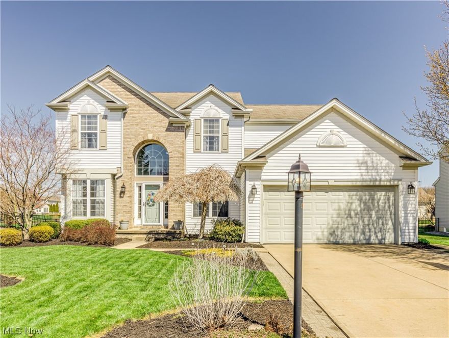 Welcome home.  This Colonial exudes relaxed elegance with updated paint and flooring throughout.  You'll love the sunny over-sized breakfast/sun room off the cook's kitchen with granite counter tops and external exhaust stove which overlooks an open yard with scenic water views. You'll delight over your 1st floor laundry, formal dining room as well as a grand fireplace to add warmth and luxury to your vaulted ceiling great room. Upstairs the over-sized master bedroom also boasts a vaulted ceiling and serene water views along with a large dual sink primary bath complete with walk-in closet, shower and soaker tub. In your expansive finished basement you'll find a back-up sump pump, large full bath, wet bar and additional bedroom. There are no RITA taxes in the township which can be a nice savings to your paycheck! A grand home worth seeing, call today for your private tour!