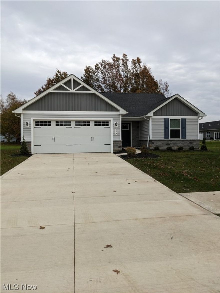 Don't have time to build? Then this home is for you! Beautiful ranch only 5 months old. Two full baths (one of main bedroom-walk in closet). Great flooring throughout. Open great room involves the kitchen and dining area for entertaining. Home backs to a wooded area.