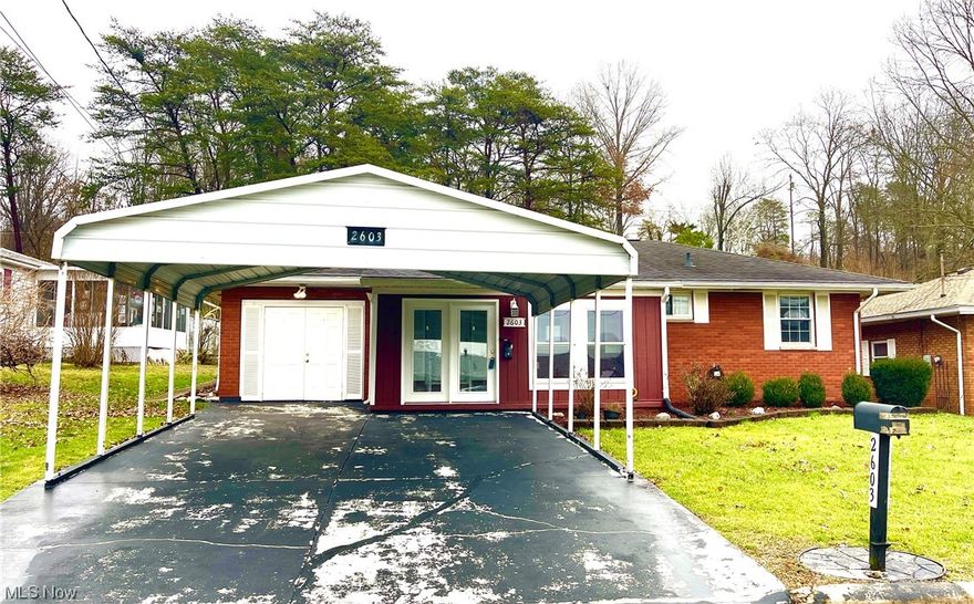 You won't want to miss checking out this beautiful, well maintained, brick ranch home offering one floor living! This home features two bedrooms, a modern kitchen with updated white cabinetry, 1 1/2 bathrooms, hardwood floors throughout, an enclosed front sun porch, and an extra large utility room with plenty of storage.  The exterior offers a double car carport, paved patio in the backyard, a large 16 X 10 storage building with electric and a smaller storage building behind it.  If you are looking for that starter home or to downsize, this home may be the one!  Call today!