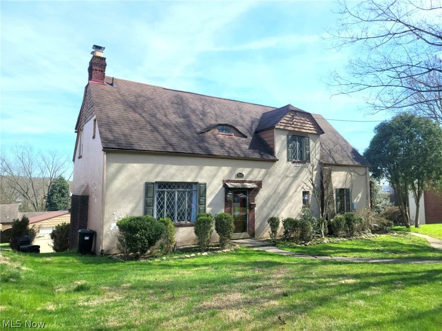 A timeless Cape Cod.  4 bedrooms, 3 full baths, 2 woodburning fireplaces, LR and basement...with insert upstairs. Newer roof, furnace\AC, hot water heater, some updated plumbing and some electrical updates. Beautiful staircase.  Newer Pella windows upstairs. Remodeled kitchen. Old world charm..a 7x15 sunroom/porch overlooking the the beautiful backyard just off the kitchen. The basement is large with a bar. The garage with alley access was closed in but can most likely be put back as a garage. The driveway is brick. Nicely landscaped back yard.