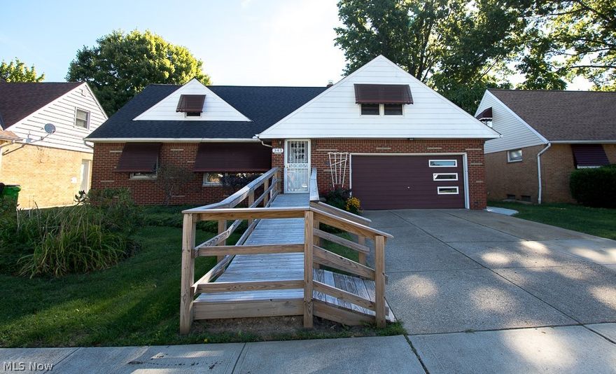 Welcome to this well maintained 3 bedroom 1 1/2 bath brick cape cod with wonderful curb appeal. This incredibly spacious home features 2 large bedrooms boasting hardwood floors and a full bath on the first floor, with the option of first floor laundry (one of the bedrooms already has the hook-ups). The main level also offers a warm and inviting living room with a beautiful picture window that leads into the formal dining area also containing a picture window to let the natural light in. Enjoy cooking in the expansive eat-in kitchen which houses plenty of cabinets and a newer stove. Retreat into the tranquil family room encased in pella windows where you'll slip into nature's oasis. The second floor reveals an enormous bedroom with built-ins and a half bath along with another oversized room that you can finish to your liking. Think about converting the second floor into a master on-suite, a fourth bedroom or ultimate walk in closet. The lower level features an oversized finished rec roo