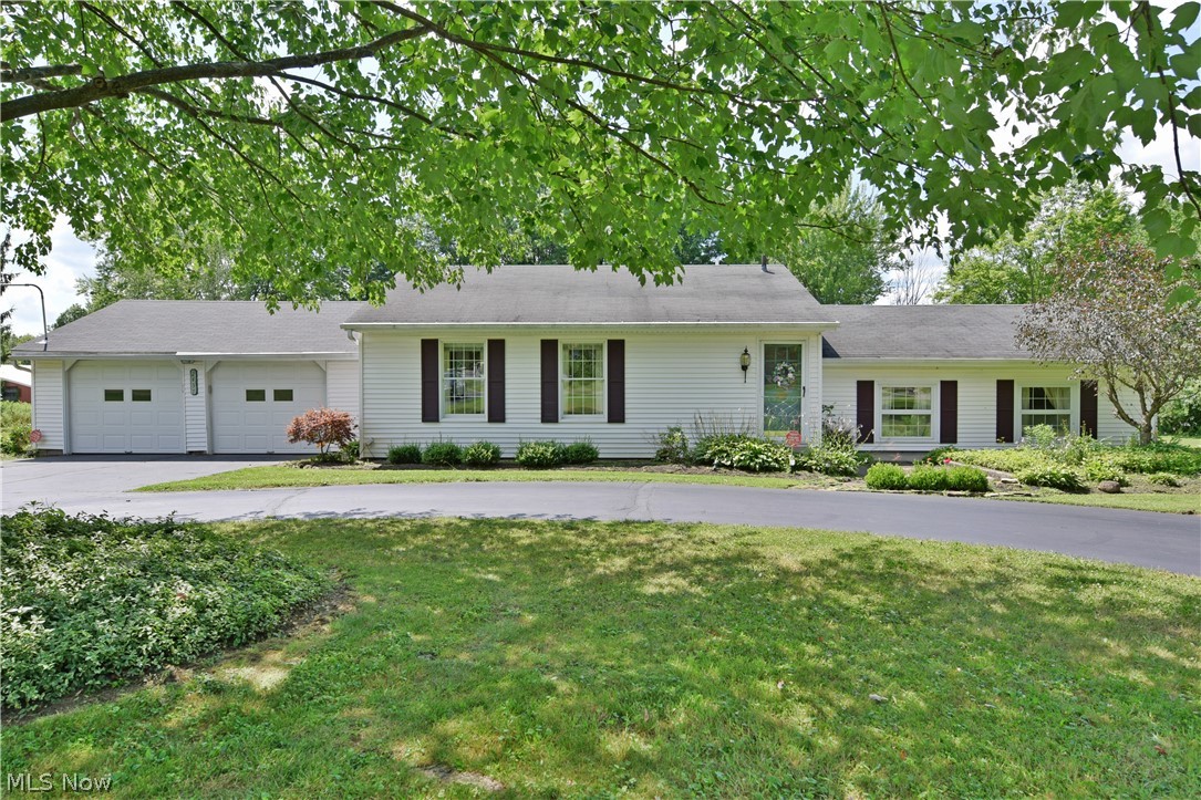 Enjoy your privacy in this 2 bedroom ranch style home situated on 1.7 acres of land. Enter into a spacious living room with plush carpeting. The eat-in kitchen is complete with Cherry cabinets, hardwood floors and appliances. The family room is right off the kitchen with plush carpeting, a wood burning fireplace and slider that leads to a patio and lovely backyard. 2 large bedrooms and tiled bath complete this adorable home. Just waiting for your finishing touches. SOLD AS-IS.