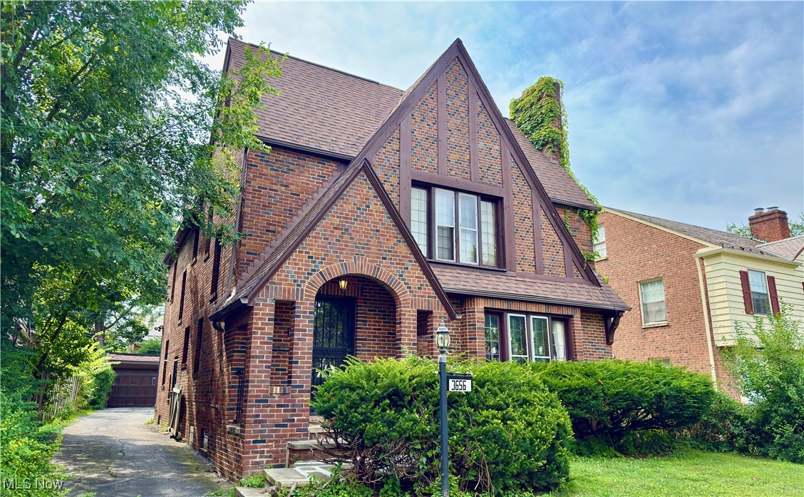 Charming brick double in great neighborhood in Shaker Heights. Very desirable street. Tons of character throughout. First floor unit features 2 bed 1 bath with central air. Excellent long term tenant. Upstairs unit combines the second and third floors featuring a total of 5 bedrooms and 2 full baths, beautiful hardwood floors, and granite countertops. Upstairs unit purposely left vacant to accomodate showings. Large three car garage. Walking distance to the Van Aken District.