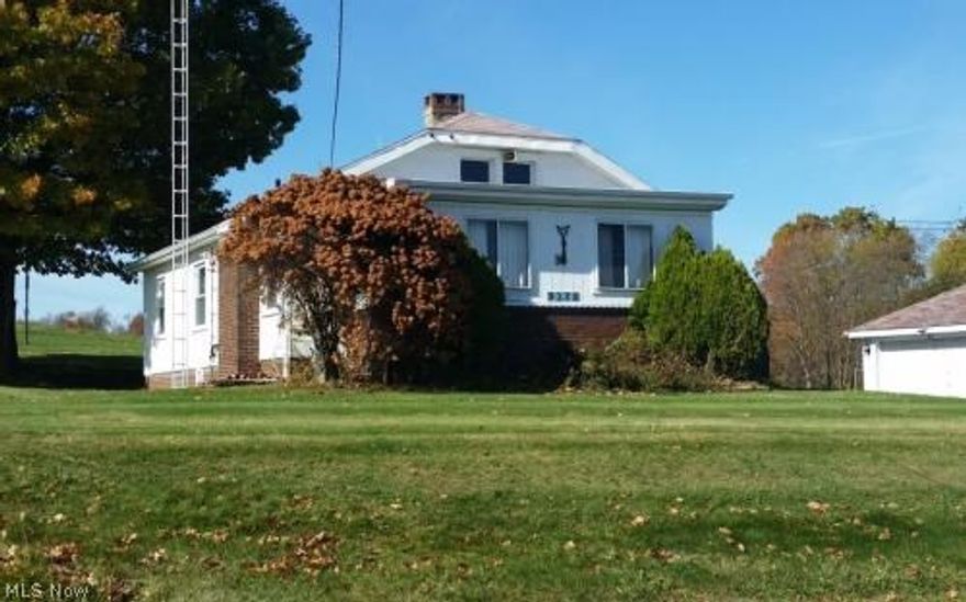 ***Absolute Auction*** Friday – November 20, 2015 – 12:00 NOON, Bungalow Style Home situated in Sandy Twp. and Sandy Valley Schools, features natural woodwork, kitchen w/ built-in stainless electric range and stainless sink, dining room, living room w/decorative fireplace, enclosed front porch, 3 first floor bedrooms, first floor bath, drop down stairs to attic storage. Full basement w/breaker electric, hi efficiency gas furnace w/humidifier, gas hot water heater and glass block windows, water softener, county sewer & well. Detached 2 car garage, paved driveway, gazebo/picnic shelter & outbuildings situated on approx 5 acres, r.e. taxes $707 per half year, Sandy Township, Sandy Valley Schools. All seller owned mineral rights transfer. Paint and decorate to your liking. Home sells to the high bidder at Absolute Auction!! Open auction day at 10:00 AM. Real Estate Sells First.