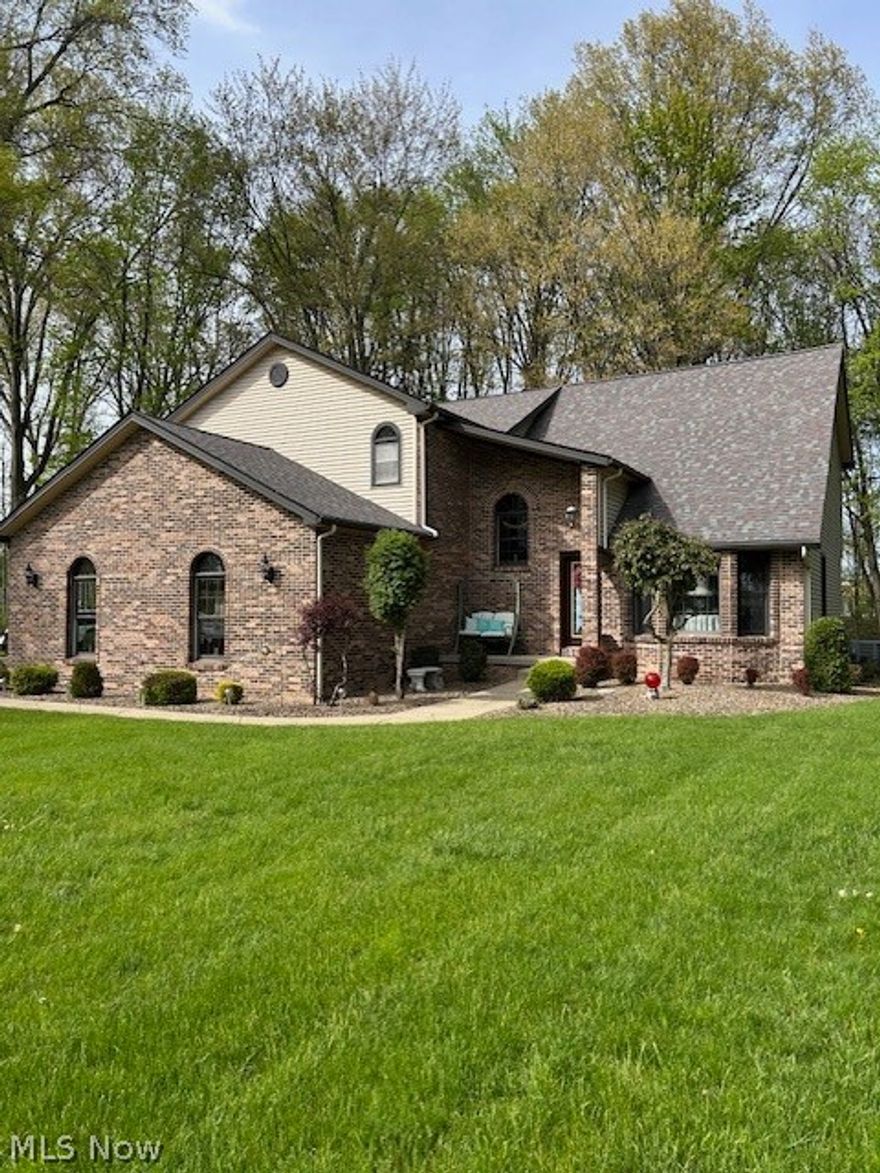 No city tax here. Great wooded lot on a cul de sac with room for large detached outbuilding if desired. Not a builder special. Custom built by the owner. 12 in. block with rods and concrete every 4 feet, double joists, 200 amp electrical, outlets as far as the eyes can see, 8'6" basement height, built in wet bar, built in book case, newer roof, hvac, well pump and h2o tank, whole house security, well is 326 feet deep for superior water quality, lincoln windows, superior insulation, all bath areas insulated for peace and quiet throughout the home and solid cherry wood work and interior doors and cabinetry. Don't wait on this custom home. location is close to all major shopping, but has the feal of a secluded country home with 1.89 acres, woods and cul de sac location.