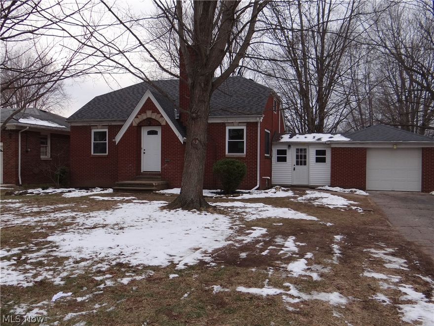 This 3 bedroom, 2 bathroom, completely renovated  brick home is ready for you to move right in. The brand new, gorgeous kitchen comes complete with solid wood cabinets, custom made concrete counter tops, glass tile backsplash, ceramic tile floor, and stainless steel appliances. The original hardwood floors and fireplace have been refinished. Almost everything is brand new in this house including the windows, all carpeting and tile, all paint, the furnace, the plumbing, and insulation. The electric has also been updated. The new master suite on the second floor has its own full bathroom and large walk-in closet. The dry basement with tall ceilings can be easily finished. You can't beat the location near downtown Amherst with a huge backyard too.