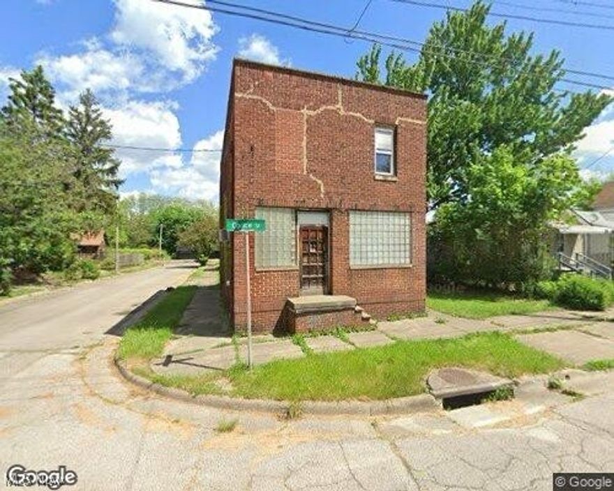 Welcome tp 555 Corice Avenue. This 2500 square feet building has open space on the main floor waiting for your creative imagination. 2 Bedroom apartment upstairs with full bath. Huge basement for storage and much more. The main floor can be used as a Lodge , Church  or Social Club. Newer furnance and Hot Water Heater.Updater Electrical. Upstairs unit is occupied. This building was last certified as a Church.per City of Akron soning department. See attached supplemental. Call for your private showing today.