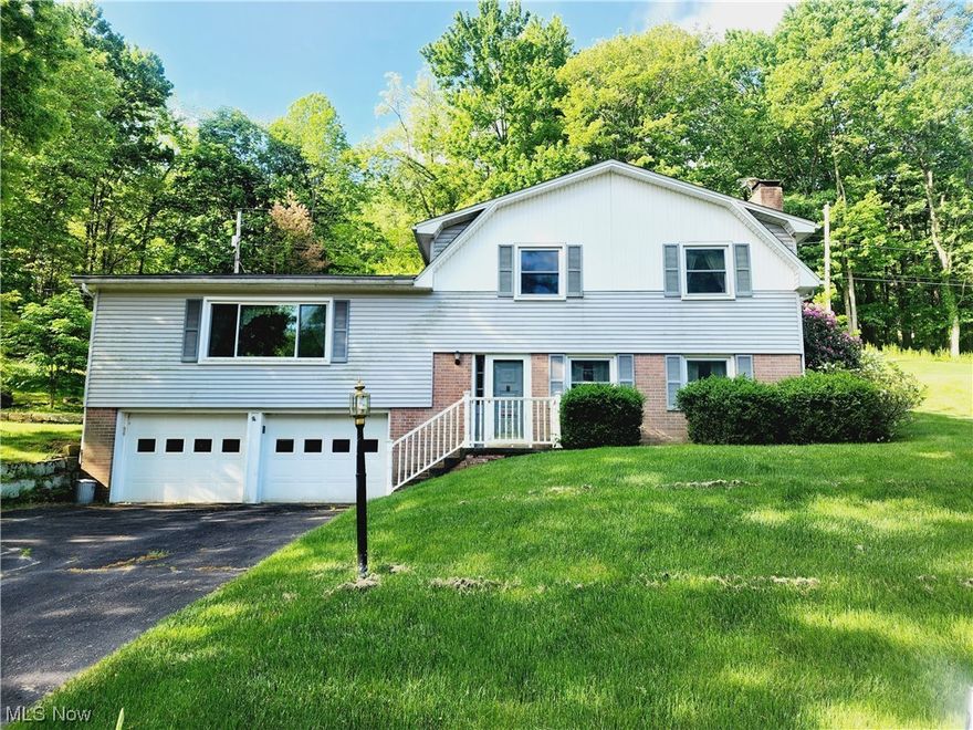 Check out this well-maintained split level home near Coshocton city schools. On the lower level it has a large family room with a wood burning fire place and the laundry room which is also a half bath. The main level boasts a living room, formal dining room, and a kitchen with sliding doors out to the sun room. Upstairs you will find three bedrooms and two full bathrooms which have been updated. This home also has a 2 car attached garage. Call today to schedule your showing!