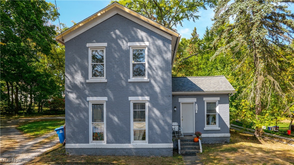 Rare investment opportunity in the heart of Kent! This unique property offers 3 separate rental units under one roof: two 1-bedroom/1- bath units and one 2-bedroom/1-bath unit, and has an expansive lot with versatile potential. With steady rental income and a strong history of occupancy, this turn-key property is ready for its next owner. Recently updated with a brand-new roof, it requires little to no effort to continue producing. Conveniently located near downtown amenities, shopping, and Kent State, the property attracts consistent demand and offers exceptional long-term potential. Whether you're expanding your portfolio or searching for a hassle-free income property, this is a must-see opportunity.