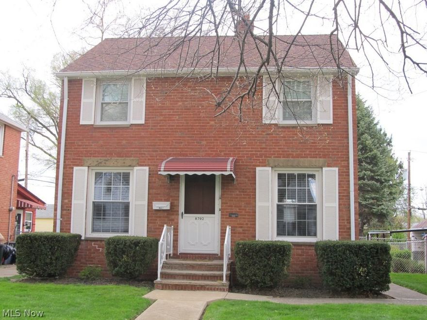 Immaculate and ready to move right into!  Don't miss out on this well-built 3 bedroom solid brick colonial with a 2-car garage.  This 1-owner home offers  a classic presence with charming features.  Featuring a dining room, an eat-in kitchen with all appliances, a living room with a decorative fireplace, and 3 bedrooms on the 2nd level with a full bath.  The partially finished basement includes a spacious laundry area, a workshop area, and a  recreation room for extra enjoyment. Updates include: roof, glass block windows, and hot water heater. 
Completing this offer is a beautifully landscaped yard!  Shows beautifully!