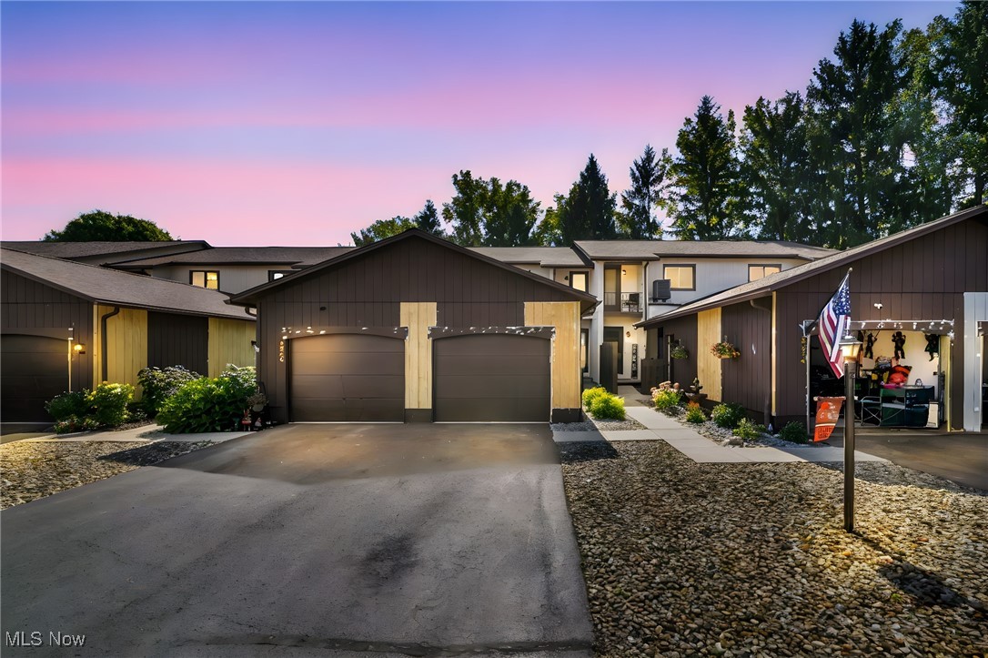 Don’t miss this opportunity! Spacious townhouse in desirable Mesa Grande Subdivision with a dramatic, fully remodeled interior and a prime lot backing to trees for privacy plus finished basement with perfect family/rec room, garage & njoy your own unique covered & fenced patio—perfect for entertaining, sports watching, or relaxing evenings! Inside, you’ll find 2 large bedrooms and 1.5 baths, a gourmet-style kitchen with all appliances, newer butcher block countertops, pantry organizer, and sliders to the amazing patio. A formal dining room is ideal for gatherings, while the inviting family room boasts a raised-hearth custom brick fireplace. The pampering owner’s suite offers a walk-in closet and direct access to the updated full bath. Cool 2nd floor balcony. Thoughtful updates include refreshed flooring, newer carpeting, LED lighting, modern vanities and commodes, updated mechanicals, and freshly painted interiors in today’s colors. The basement expands your living options with a finished rec room, storage space, and even an extra shower. Added convenience with a private garage, plus a nearly new washer & dryer. Enjoy outdoor living with both a covered front patio and rear patio to savor every season. The well-cared-for community features a pool and association-maintained exterior with fresh siding and paint. Perfect location close to freeway access, restaurants, shopping, recreation center, and more. Move right in and enjoy this exceptional Mesa Grande townhouse!