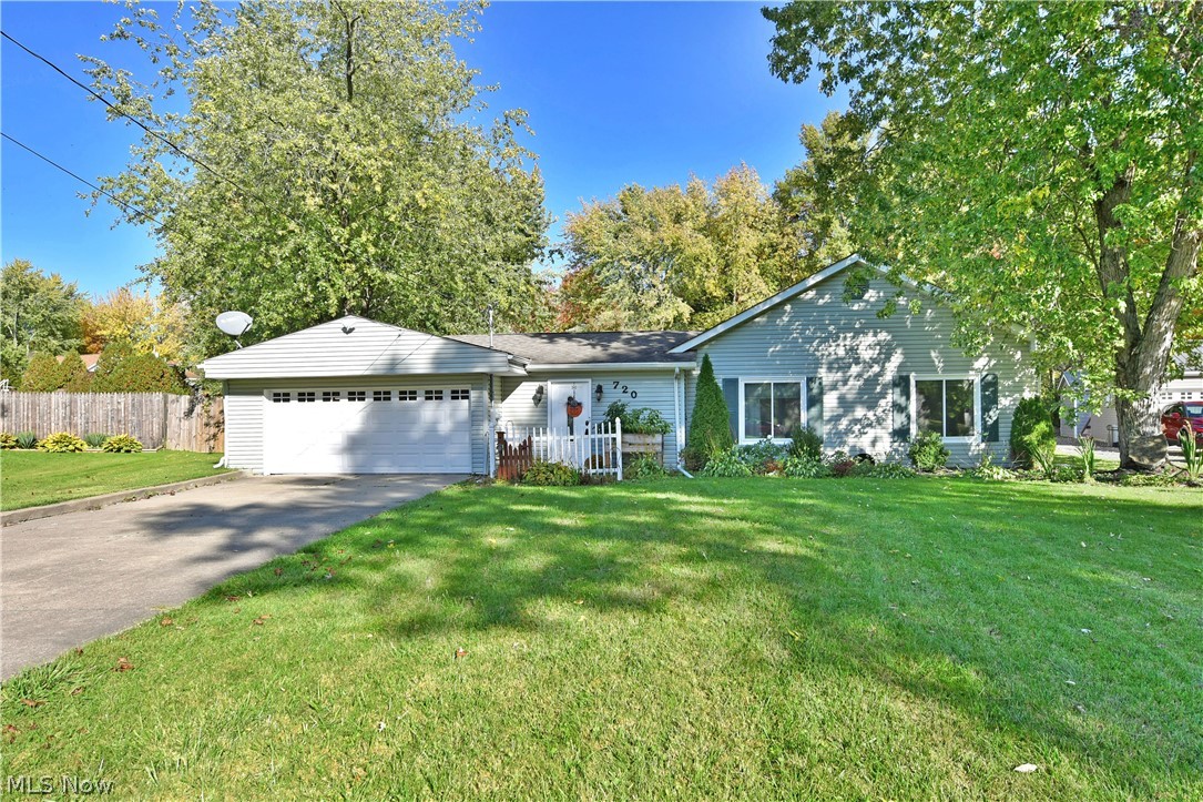 Get lost in the beautiful details and delightful updates of this three-bedroom Champion Township home! The charming ranch layout rests on a pie-shaped lot that expands into a must-see backyard, fenced-in for added serenity and including a fantastic rear patio, above-ground pool, and bonus, oversized storage shed with a bold red steel roof. Step through the front door as the tiled foyer opens to reveal a remarkable kitchen. Dark stained countertops surround a mobile center island as the artful hanging lights add to the style as they shimmer off the stainless appliances. Cool gray walls follow past the raised bar top seating and nearby casual dining to find a welcoming living room, illuminated in both natural and recessed lighting from above. Down the main hall, a pair of nicely sized bedrooms showcase their deeply shaded colors, contrasted by new natural-colored carpets. An equally bright full bath awaits across the hall with its updated shower and large vanity. The spacious laundry room with washer and dryer staying is located before the master bedroom suite. The large master bedroom offers dual mirrored closets and a private master bath. Updates include: vinyl replacement windows 2020, furnace 2021, hot water tank 2015, kitchen stove and microwave 2019, pool with deck 2018, new rear concrete patio 2020, privacy fence 2020, and so much more plus a one year home warranty!