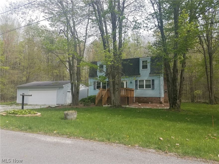 Are you looking for a ton of space for your family....then you just found your new home!!!! This 4 bedroom 2 full bath 2 story home features brand new open kitchen with all appliances to get things ready for your family picnics and look out the bay window at everyone enjoying the big private back yard surrounded by woods. Perfect for your summer night bonfires and campouts. When the time comes for the snow to fly relax in your huge living room with working fireplace to warm up on those winter nights. 3 big bedrooms upstairs with full bath and a first floor bedroom with first floor full bath. Finished basement has big family room for extra room when you have family gatherings. Extra room in basement for 5th bedroom or office. Laundry room ... washer and dryer stay. Another room plumbed for bathroom in basement. Nice front deck to sit and have your morning coffee. Extra deck on the side...and patio off the back of the 24 x 36 garage (built in 2000) with cement floor and electric. Newer w