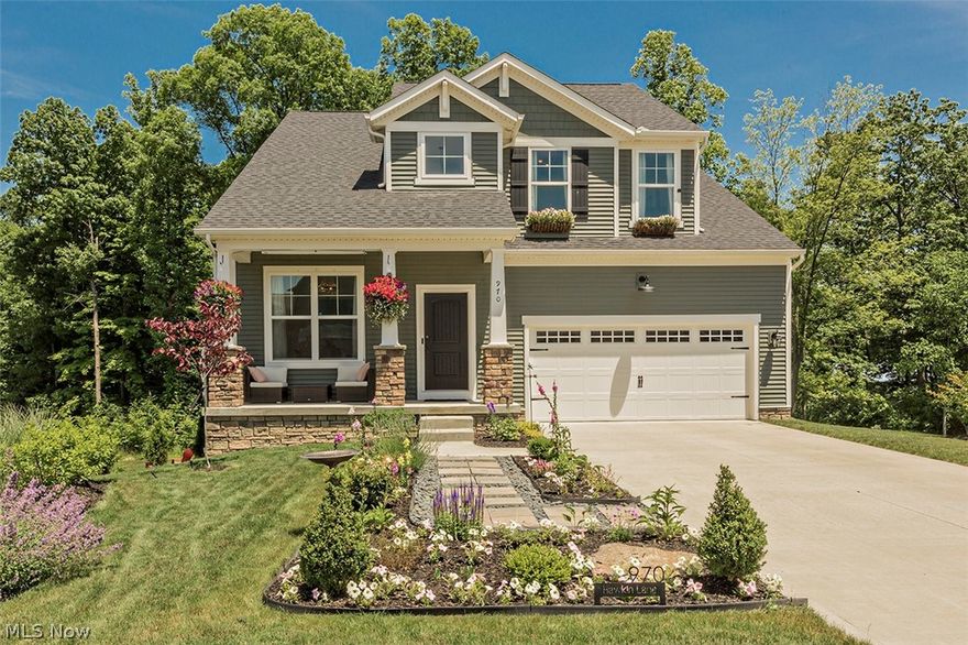 Just built in 2019, this is new build living without the wait.  Beautiful Drees built home with the perfect combination of stunning cosmetic selections and impressive safety, smart home features.  An open floor plan in the main living space features a dazzling kitchen with hardwood floors, quartz countertops, and silent close cabinetry.  The large island, new stainless steel appliances, and coffee bar finish the space.  Adjoining the kitchen are the first floor laundry room and mud room off the two car garage.  Retreat upstairs to any of the four spacious bedrooms (two include walk-in closets) and two full baths.  The bonus room in the lower level has walk-out access to the charming backyard and spa hot tub. Additional 389 sq ft of unfinished utility/ storage space on this level, and pre-plumbed for a full bath. You must see the custom landscaping and amazing outdoor space. Between the community and conservation space, there’s a total of seven acres, including two ponds, for the reside