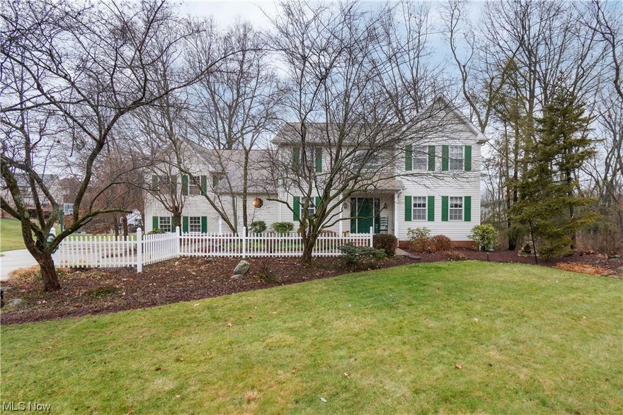 This two story with 4 bedrooms & 4 1/2 baths has a very well thought out floorplan.  Custom built by Collier Construction for his personal residence so you know it is solid and well built.  There are two master suites, one has its own wing of the home with a separate staircase.  This suite is huge with multiple walk in closets (hers has its own vanity and sink!), multiple built ins and a beautiful fireplace.  This home sits on a very private lot with 17 acres of wooded land to the rear and side with views of a pond and tons of wildlife.  The kitchen has been updated and features white cabinets, corian countertops, a pantry and serving island in the dinette area which is awesome for entertaining! The kitchen has a gas log fireplace which is open to the family / hearth room with lots of natural light and a private view. Walk thru the double doors to the sunroom with many windows, its a great place to read your fav book and drink your morning coffee. Finishing off the first floor is a home office, living & formal dining rooms, 1/2 bath and huge mudroom area. The second floor has 3 bedrooms (one is a 2nd master) and 2 more full baths.  The walk out lower level has tons of storage, game room with pool table, 5th bedroom or family room, full bath and huge laundry room. Bonus: there is a huge storage area built in under the garage and furnace room for all your lawn care items and toys this can be accessed outside on the back of the home.  This home is in a great location and waiting on its new owners! Owner just installed new carpet in the sunroom, dining and living rooms.