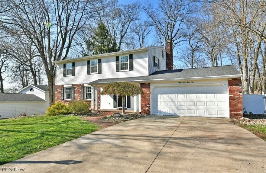 Don’t miss your chance to make this home your own!  This is a rare opportunity to own a home where a brand-new roof will be escrowed by the sellers, giving you the opportunity to choose your own shingle color before it’s completed!

This standout four-bedroom home in Sherwood Greens, Howland offers the space, layout, and location you're looking for.  With three levels of finished living space and a private backyard designed for both relaxing and entertaining, this home delivers in one of Howland's most desirable neighborhoods with the best shopping, restaurants, and entertainment just minutes away.

From the curb, the home makes a strong first impression with classic brick accents, stone-lined landscaping, and a welcoming covered front porch. Out back, the fully fenced yard is built for enjoyment, featuring a spacious patio, a bright three-season sunroom surrounded by windows, and a large storage shed.

Inside, the foyer opens around a central staircase and leads to a convenient half bath, garage access, and a recessed coat closet. The main level offers both comfort and flexibility, with a cozy family room highlighted by a brick fireplace that flows directly into the sunroom, plus a separate living room that connects seamlessly to a formal dining space. The centrally located kitchen features ceramic tile flooring and generous counter space, making it ideal for everyday living and hosting.

Upstairs, you’ll find three spacious guest bedrooms and a full bath, along with a large primary suite offering ample closet space and its own private full bathroom. The partially finished lower level expands your living options with a rec room featuring a second fireplace, along with dedicated laundry and storage areas.

With renewed availability, improved value, and a layout designed for modern living, this is an opportunity you don't want to miss.  Call today to schedule your showing!