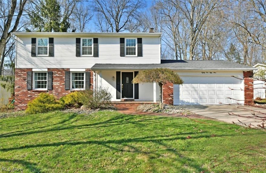 Sometimes the perfect home finds you—and this stunning four-bedroom residence in the Sherwood Greens neighborhood of Howland is ready to impress. Offering three floors of finished living space, this home combines comfort, style, and functionality, and features a serene backyard perfect for relaxing or entertaining. Nestled in a highly sought-after neighborhood, you’ll enjoy access to excellent schools and a central location close to the best restaurants and shopping in Trumbull County.

From the moment you arrive, warm brick detailing and stone-lined landscaping create standout curb appeal. A welcoming covered porch invites you inside, while the fenced backyard showcases a spacious patio, a bright, window-lined three-season sunroom, and a large storage shed—perfect for both relaxing and entertaining.

Inside, the foyer opens around a carpeted staircase and leads to a convenient half bath, garage access, and a recessed coat closet. The home offers both a cozy family room with a brick-accented fireplace—flowing seamlessly into the sun-filled skylit sunroom—and a comfortable living room that transitions into a formal dining space. The central kitchen features ceramic tile and ample counter space, ideal for everyday living and hosting.

Upstairs, three generously sized guest bedrooms are paired with a well-appointed full bath, while the oversized master suite offers abundant closet space and a private full bathroom. The partially finished lower level adds even more versatility with a rec room with an additional fireplace, plus tucked-away laundry and storage areas.

This home delivers space, charm, and a setting you’ll love—inside and out.