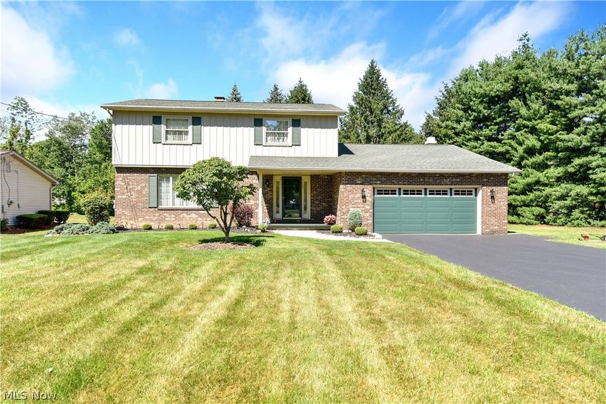 This 4 bedroom/3 bath colonial located in Liberty has been meticulously maintained.  The home boasts over 2300 square feet of living space and offers over a 1/3 of an acre with beautifully landscaped yard.  You will love the eat-in kitchen with tons of counter and cupboard space.  In addition there is a pantry, island and sliders that lead to the back patio.  The kitchen opens to the generous sized family room with fireplace, recessed lighting and dual ceiling fans.  The first floor gives you lots of space to spread out with the additional living room and dining room. For convenience there is also a first ½ bath. Upstairs are 4 generous sized bedrooms including the master bedroom with master bath.   There is an additional bathroom plus lots of closet and storage space.  The   2 car attached garage has slip resistant nature stone flooring and additional pull down storage area. Located in the basement is your laundry area and a separate workshop area. Updates include: (2017) sump pump; (