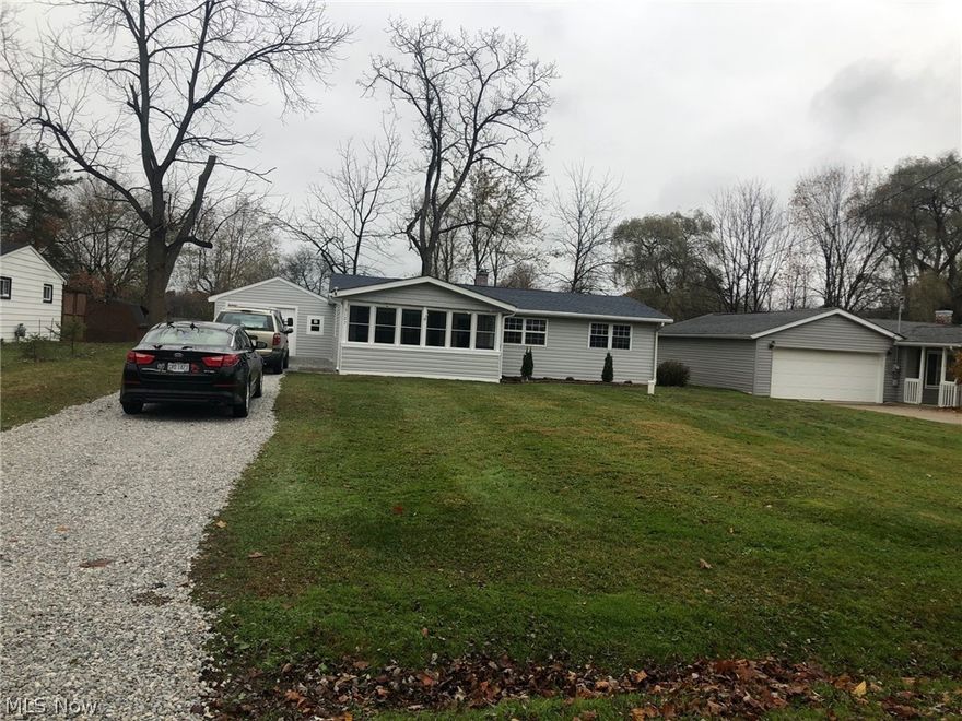 Completely updated beautiful ranch! Features include: New  well & pump, carpet, roof, windows, electric. Also all new kitchen cabinets, counters & flooring and bath cabinet & flooring. New furnace & central air. Four bedroom, enclosed front patio, private back patio ready for a hot tub! One and a half car garage and a storage shed too!!