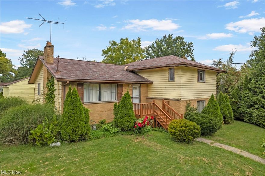 Welcome to this charming split-level home with a spacious interior. This 4-bedroom, 2.5-bath property offers great potential but needs work. As you enter the lower level you are welcomed by a remodeled half bath, bedroom and a large family room with built-in bar. Continuing to the main floor you will enter the kitchen that has laminate flooring and also the dining room and living room with beautifully finished hardwood flooring. Continuing to the second floor you come upon a master suite with its own private bath and also two additional bedrooms and a full guest bathroom. Additional features are the unfinished basement and a two car detached garage. Property is being sold "as is". No FHA or VA.