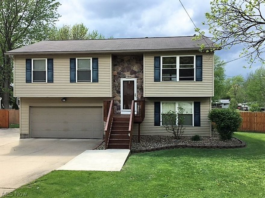 Welcome to this open concept, immaculate, extremely well cared for and updated home.  You will feel right at home when you walk in the door and are welcome by the warm colors and new ceramic tile in the entry foyer and garage foyer.  The kitchen was a complete remodel in 2015 and a new patio door was added this year. You will also enjoy the large deck off the kitchen, overlooking the yard. The lower level has new carpet, and a walkout patio door to the expansive fenced in back yard.  The front fence was new in 2016.  The closets even have new organizers for you to move in and be ready to go.