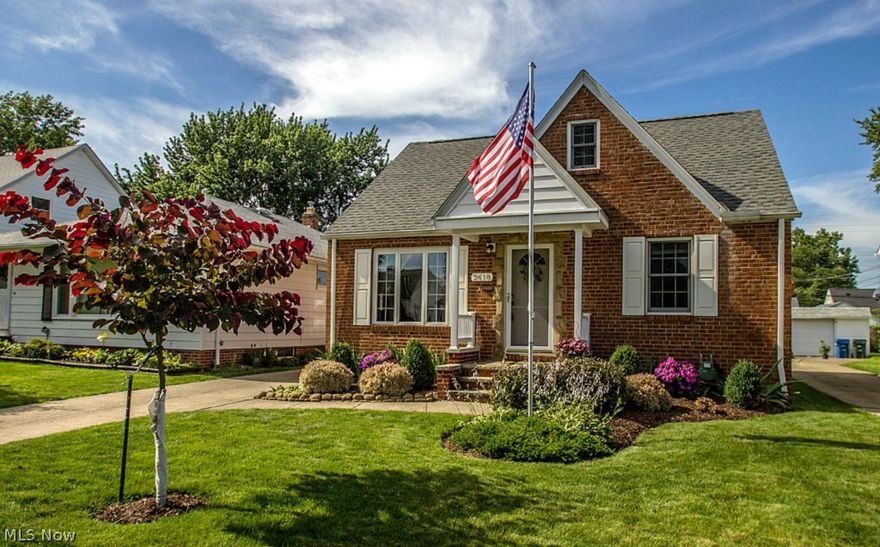 Beautiful All Brick Bungalow nestled in Parma w/ many important updates done so you can Move Right in and Enjoy!  This home boasts charming curb appeal w/ lush landscaping & covered front porch. Bright & inviting living room w/ neutral carpet & paint. Tastefully updated eat-in kitchen w/ new cabinets, backsplash & ceramic tile floor. 2 generously sized bedroom w/ hardwood floors & updated full bath complete the main level. Upstairs you will discover the intimate master bedroom w/ beautiful hardwood floors, cedar walk-in closet, custom built-ins & sitting area. Spacious finished lower level w/ sprawling bar, ample storage space & separate laundry area w/ convenient utility tub. Low maintenance backyard w/ oversized 1 car garage w/ attic storage, patio area & adorable flower bed/garden. Large list of improvements include: New roof w/ 30 yr warranty(2012), Bathroom vanity, floor & paint (2015), Kitchen updated (2010), New drywall, ceiling, & paint in finished basement (2013), Newer glass