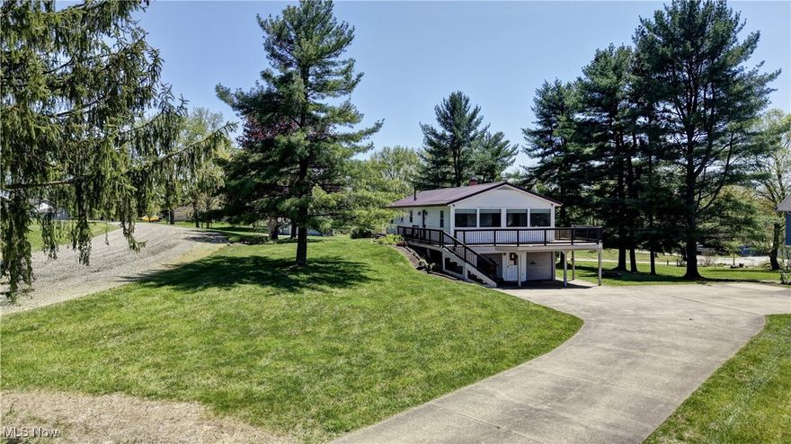 Don't miss this opportunity to own a charming 2-bedroom, 2-bath ranch home in the highly desirable Lake Buckhorn in Holmes County. This 1,936 sq ft home, built in 1971, sits in a great setting overlooking the lake—offering stunning lake views from your wraparound porch. The home features a finished basement that’s been freshly updated in 2021 with new flooring, a tile bathroom, perfect for additional living space or entertainment and an attached 2-car garage for convenience and storage. The main level includes a spacious layout, with a kitchen, dining room, 2 bedrooms, bathroom and laundry room. Whether you're into fishing, boating, or simply relaxing by the water, this home gives you full access to all that Lake Buckhorn has to offer. Updates to the home include complete basement remodel, Ac unit/furnace, garage door and flooring on the main floor in 2021. All the appliances transfer with the property.  Contact us today to schedule a showing.