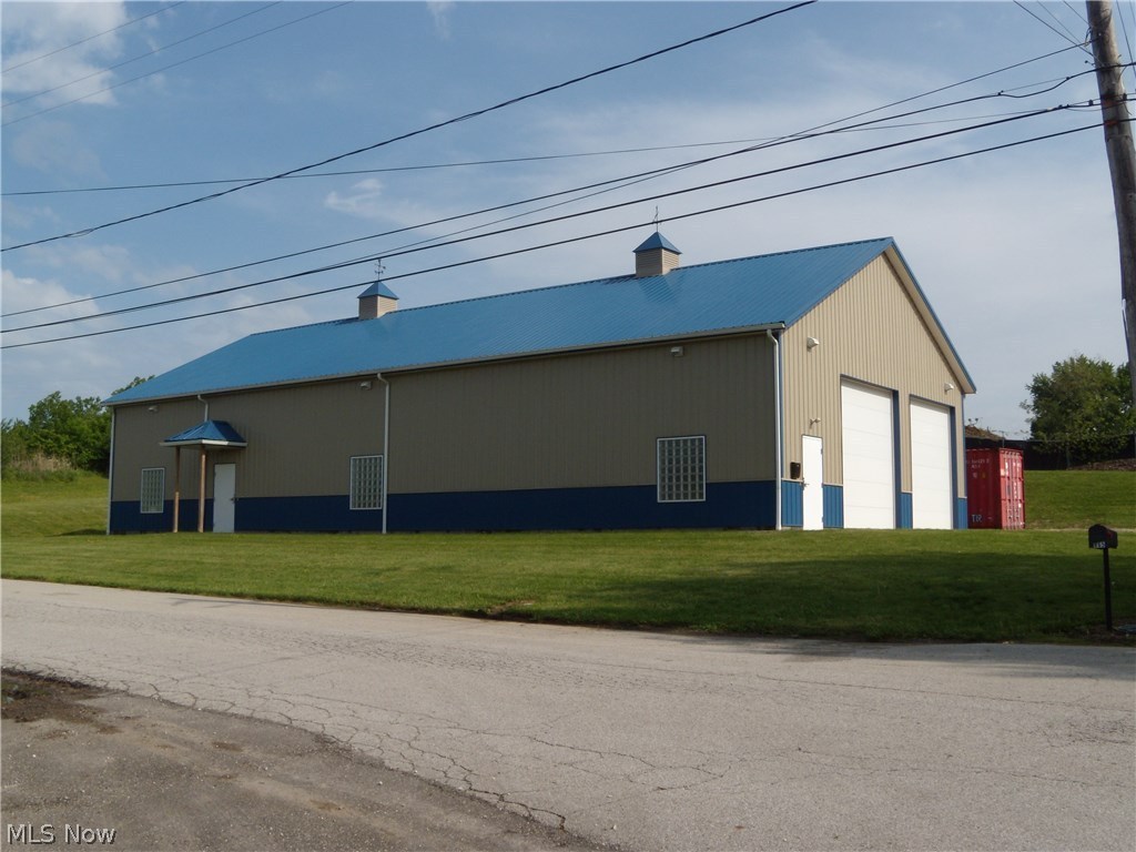 Great opportunity for your business. Built in 2011 zoned Commercial U4. Approximately 3200 sg ft of warehouse space with 2 12x12' bay doors, 2 entry/exit doors, 14' ceilings, 21x16 storage loft, 6" concrete floors with drains, and glass block windows. The interior walls and ceilings are drywalled with extra insulation. There are 2 Mr Heeter Big Max gas heaters in the warehouse. The office has heat/ac and a kitchenette area with a sink and a space for a mini fridge. There is a bathroom and utility room. Sale is for the land and building only. Call today for a private showing.