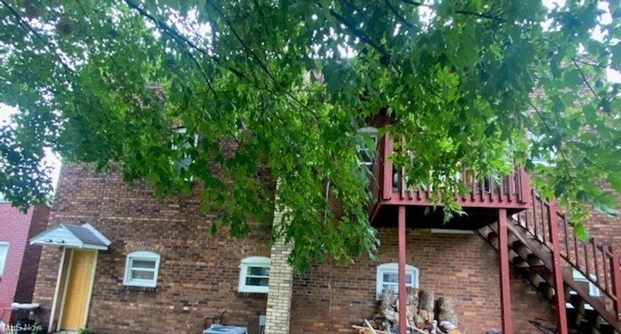Nice Brick home. Master bedroom with Living room area on first floor. 2 bedrooms, Kitchen and full bath upstairs. Sitting on double lot, located in downtown Dennison
