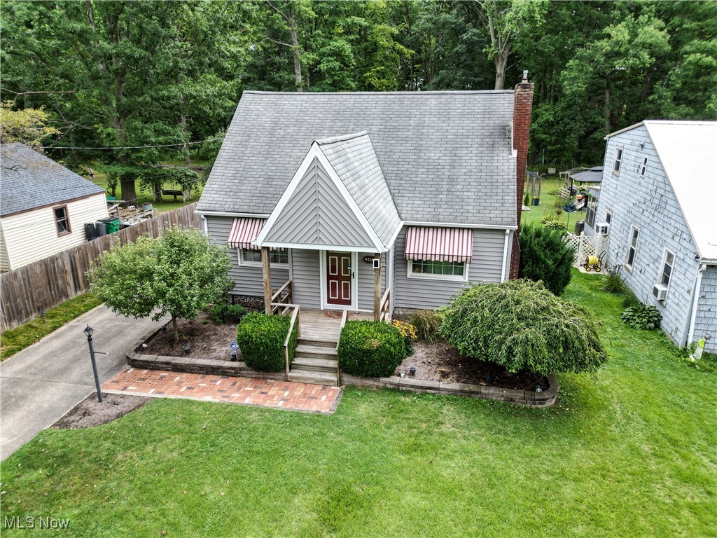 Welcome to 3580 Woodside Dr., where the seller has poured nothing but love into this home for the past 48 years! This 3-bedroom, 2-full bathroom Cape Cod is located in Labrae LSD, is almost 1500 sq. ft. and ready for immediate possession! When you pull up to this home, you'll notice an adorable vinyl sided home, nice landscaping, a quaint front porch and a beautiful concrete driveway! Walk in and you'll be greeted by a living room with woodburning fireplace, a dining room and an updated kitchen with maple cabinetry, hardwood floors and stainless-steel appliances that stay! A full bathroom with new stand-up shower and a bedroom with hardwood floors reside on the first floor as well. A large living area addition off the kitchen is perfect for family gatherings, has a remote gas fireplace and an attached sunroom with new windows that lead out to the 2 car-garage. You will enjoy these soon-to-be fall mornings in the peaceful backyard with 2 pergolas and a privacy fence on either side! Upstairs are 2 additional bedrooms with tons of built-in storage and closet space! There is a partial basement with a full bathroom and stand-up shower, laundry area, workbench and waterproofed crawl space (2024). Other updates include A/C (2023), Range & Refrigerator (2023), newer Hot Water Tank, & updated Electric (2013). Don't miss out on this one!