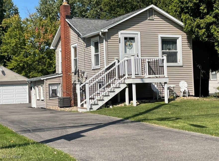 Really unique 2 bedroom vinyl sided bungalow. Features living room, eat in kitchen with appliances, and knotty pine den. Utility area with washer and dryer. Newer shingles, hot water tank, furnace, central air, replacement windows, leaf filter, and more. Double car garage with opener. Plenty of parking. In great shape. Just move right in!