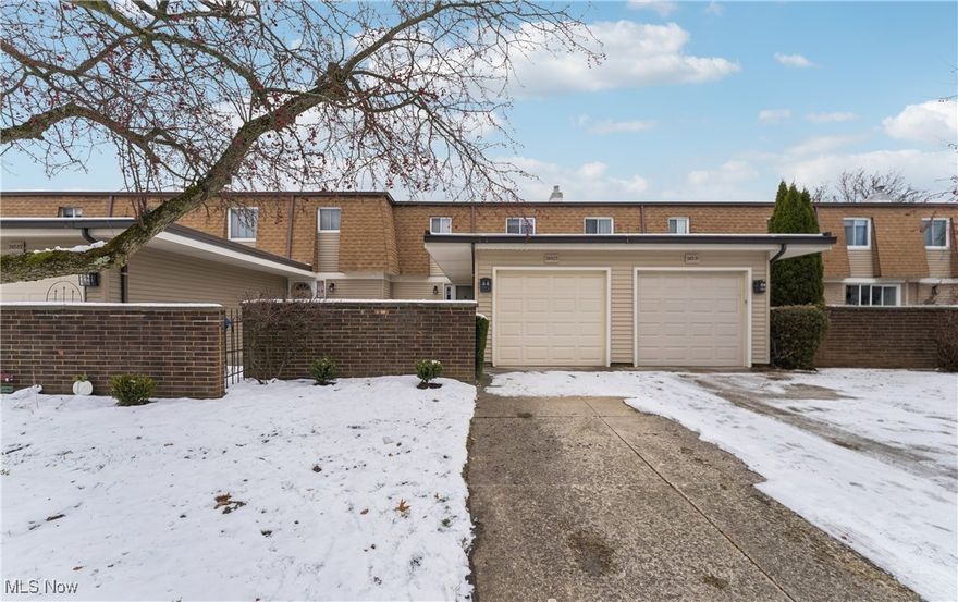 Move right into this charming 3-bedroom, 1.5-bath townhome complete with an attached 1-car garage. Freshly painted, this condo features brand-new carpet and luxury vinyl flooring throughout. Enjoy a bright and spacious living room that flows into the dining area, where sliding glass doors open to a private patio—perfect for relaxing or entertaining. The refreshed kitchen boasts newly painted cabinets and comes fully equipped with a stove, refrigerator, and dishwasher. The lower level adds even more living space with a cozy recreation room, plus a convenient laundry and storage area. With updated plumbing and electrical systems, this home is truly move-in ready and waiting for you.