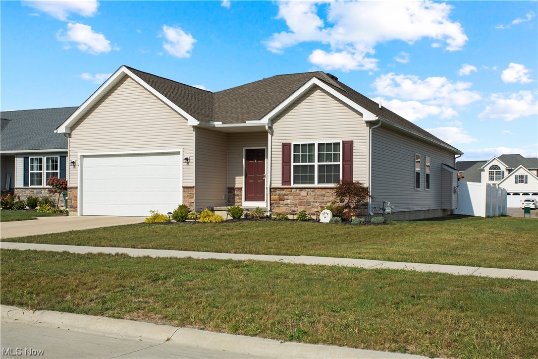 Your Dream Home Awaits in Lorain's Martin's Run Development! Step inside this 2021 ranch-style home that's a true gem. With 3 spacious bedrooms, 2 baths, and an open floor plan, it's designed for easy first floor living. The master bedroom boasts a massive walk-in closet for your wardrobe dreams. But there's more! Check out the beautiful partially finished basement, perfect for leisure, and a non-finished section that's a storage heaven. Your dream home awaits!