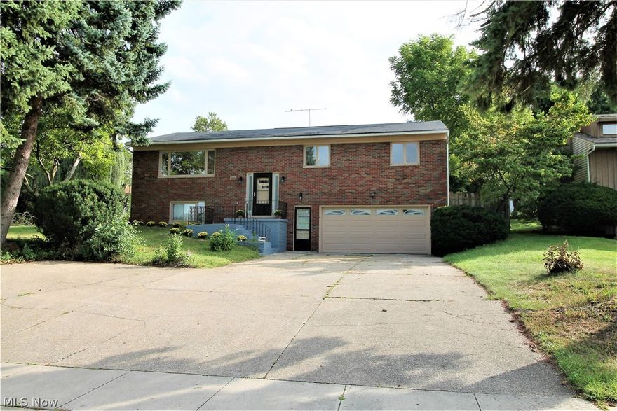 Gorgeous four bedroom, 3 full baths, split-level home w/open floor concept and beautiful refinished oak floors; freshly painted throughout w/all Eco friendly materials. Upstairs takes you to the large open & bright kitchen w/newer flooring and counters, sink and faucets, with plenty of room in the kitchen for an eat in kitchen as well. Off the kitchen is the open dining rm w/easy access to the large deck to enjoy barbecuing or just relaxing. Enjoy the newer privacy fence for the backyard as you entertain your guests. The master bedroom has an elevator to take you down to the laundry rm which has recently been serviced & makes this wonderful home truly one floor living! The three bedrooms all w/wood flooring complete the upstairs. There are newer light fixtures throughout this amazing home. Updates include bathroom eco-friendly flooring w/newer brushed nickel Delta faucets, newer vanity countertop & central air, including the dishwasher all in 2017, along with a newer radiant heating sy