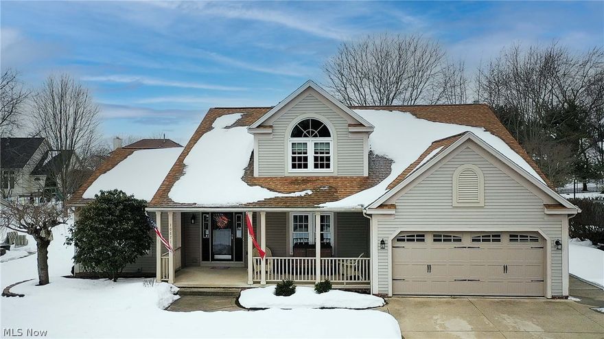 Welcome to this fabulous/immaculate home in desirable Greentree and "excellent" rated North Canton Schools. An inviting cover front porch (24x9) and foyer lead you to this lovely open floor plan, bright, and spacious home. The fireplace in the two-story great room is a beautiful focal point with a floor-to-ceiling stone and wood mantel. The great room is open to the eat-in kitchen, which offers granite countertops, a tile backsplash, breakfast bar, stainless appliances, lots of cabinet space, a nice-sized pantry, and a dinette area w walkout to the deck and private backyard. 1rst floor master suite has a vaulted ceiling, a spectacular master bath with double sinks, his & her closet, a beautiful tile surround walk-in shower w dual shower heads (Moen), and LED lights. A formal dining room w hardwood floors, a butler's pantry, a convenient half bath & laundry w a utility sink & overhead cabinets complete the main floor. Upstairs you will find three bedrooms w large closets, a full bath, a
