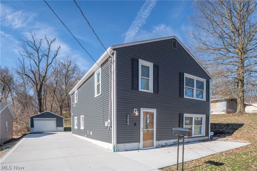 Updated and move-in ready, this charming Barberton home offers 3 bedrooms, 2 full baths, and a functional layout with plenty of space to enjoy. Step inside from the front concrete patio to a welcoming entry with coat closet, opening to a cozy living room and dining area. The fully applianced kitchen features abundant cabinetry and convenient access to the backyard. A full bath is located on the main level, while upstairs you’ll find all 3 bedrooms, including a primary bedroom with 3 closets, a second full bath with tub/shower combo, and the convenience of a large second-floor laundry room. Outside, enjoy the back patio with attached awning, yard space, and detached 1-car garage. A great opportunity to own an updated home with comfort, function, and value in Barberton.